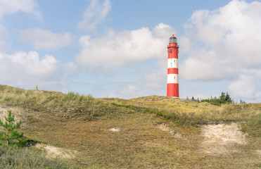 Fototapeta na wymiar Leuchtturm in den Dünen von Amrum