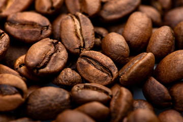 Coffee beans close-up background. Fresh roasted