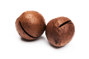 Shelled  macadamia nuts on white background