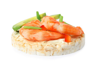 Puffed rice cake with shrimps and avocado isolated on white