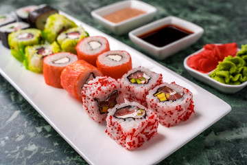 Japanese sushi set with soy sauce, wasabi and pickled ginger