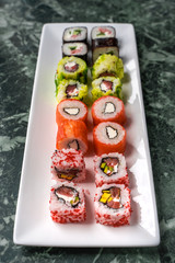 Fresh made sushi set on white plate