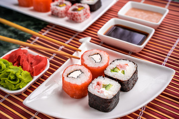 Japanese sushi set with soy sauce, wasabi and pickled ginger