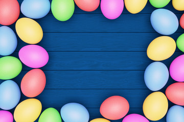 Multicolored eggs on a blue wooden table, happy Easter concept, copy space.3D rendering.