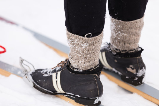 Female Legs In Vintage Ski Boots, Standing On Skis