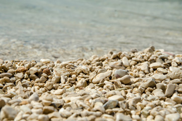 Stony beach - Stone and water in macro photo
