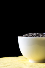 White bow full of chia seeds
