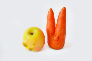Ugly carrots.Funny, unnormal vegetable or food waste concept. Unformatted vegetables.