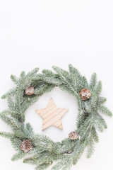 Christmas wreath. Christmas decorations on white background. Flat lay, top view