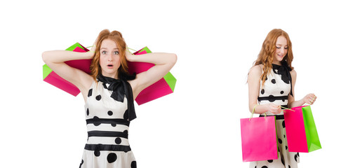 Young woman with shopping bags on white