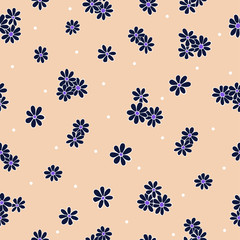 Bright dark blue flowers with white spots on pink-beige background. Seamless summer pattern. Suitable for packaging ,wallpaper.