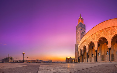 The Hassan II Mosque is a mosque in Casablanca, Morocco. It is the largest mosque in Morocco with the tallest minaret in the world. - obrazy, fototapety, plakaty
