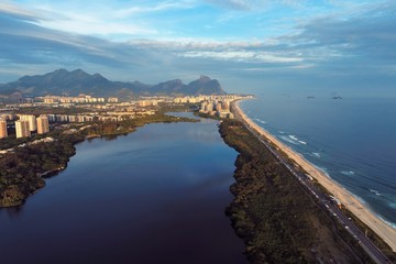 Aerial view of sunset on Barra da Tijuca's Beach,  Rio de Janeiro city in the sunny day, Brazil....