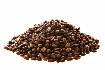 heap of freshly roasted coffee beans isolated on a white background