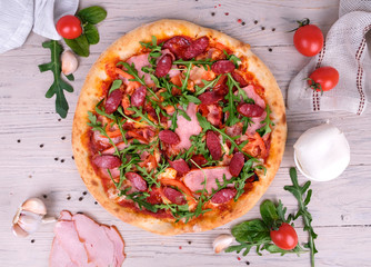 pizza with tomatoes and mozzarella