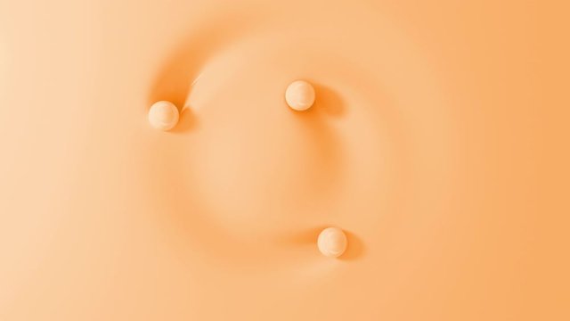 Three yellow pastel balls rolling around circle on soft surface. Top view of spheres touching liquid material. 3D render animation. Seamless loop.