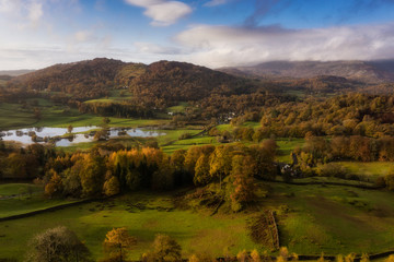 Fototapeta na wymiar Beautiful vibrant aerial drone landscape image of sunrise in Autumn Fall over English countryside