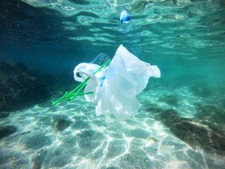 Plastic bags with bottles pollution in ocean