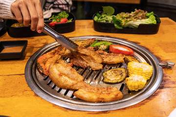 Streaky pork , shrimp and vetgetable on charcoal grill for barbecue korean or Japanese style yakiniku.