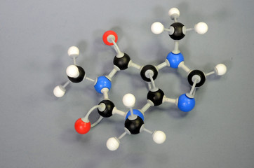 Molecule model of Caffein (Coffein). White is Hydrogen, black is Carbon, red is Oxygen and blue is Nitrogen.