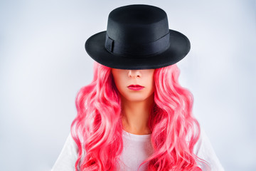 Girl with pink hair on a white background