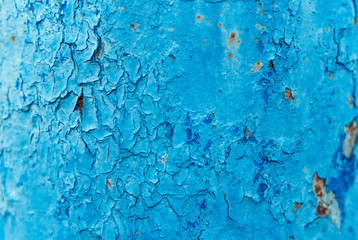 Old Rusty painted metal background. Blue Peeling paint texture.