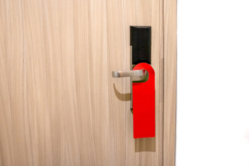 modern interior wooden door with a sign please clean