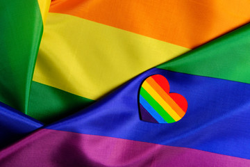 LGBT pride flag with the heart coloured in the LGBT pride colours. Concept of the Valentine day, freedom, equality