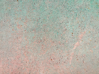 Veneer peeling paint dark green color painted old wall, texture background