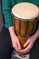  Hands of a girl on a drum