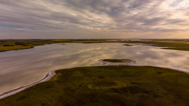Aerial drone photo of a lake near Saskatoon Saskatchewan Canada at sunset