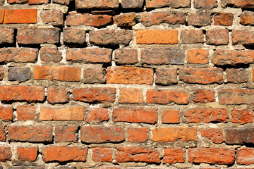 Orange bricks old vintage wall. Abstract architectural  background for design.