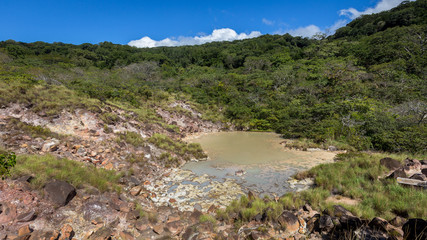 Fototapeta na wymiar pool of mud and hot water on the slopes of the Rincon de la Vieja volcano