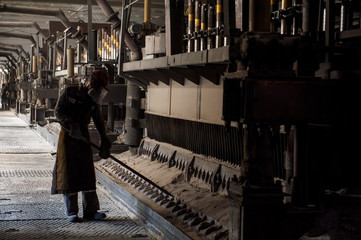 Naklejka premium Aluminum plant. aluminum smelting bucket. Safe environmental high-tech processes. Modern smelter. Melting furnace