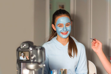 Two Teenager bloggers test beauty products for their followers and tell their impressions,...