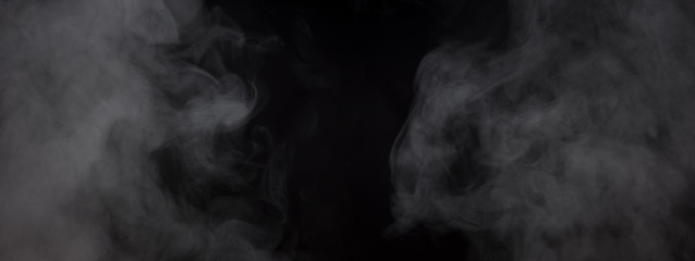 Smoke in panoramic black background. Large mist in dark room on black background. 