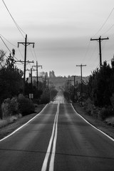 Sunset view of Lambert Road next to Smith Rock State Park in the background