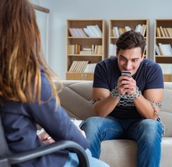 Man suffering from phone dependence visiting doctor