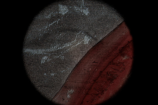esfera roja blanca y gris vista por el microscopio simula paisaje c&oacute;smico