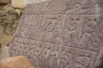 Ancient tibetan texts carved in stone
