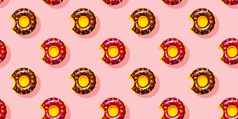 Top view colourful doughnut toy seamless pattern on light pastel pink background. Flat lay illustration colourful design. Minimal style summer concept.