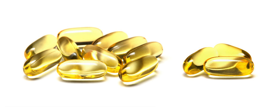 Isolated fish oil capsules  on the white background.