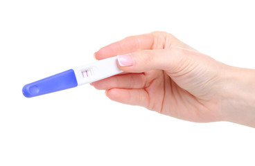 Positive pregnancy test in hand on white background isolation