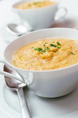 Soup cup with a home made vegan raw pumpkin soup.
