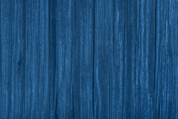 Blue wooden background. Wood texture in classic blue. Color of the 2020 year.