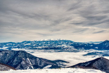 Fototapeta na wymiar Snow and Fog mountain in slovakia 