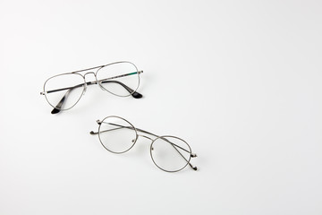 Transparent glasses on a white background