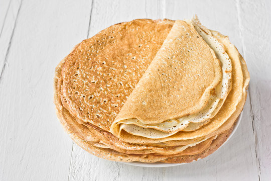 Stack of russian pancakes (crepes). Traditional Maslenitsa (Shrovetide) meal.