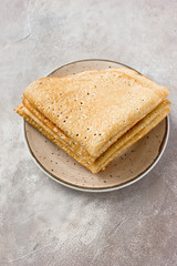 Stack of russian pancakes (crepes). Traditional Maslenitsa (Shrovetide) meal.