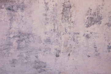 The texture of the old concrete wall with scratches, cracks, dust, crevices, rou